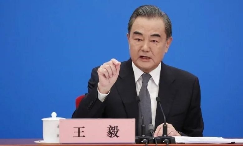 Chinese State Councilor and Foreign Minister Wang Yi attends a press conference on China's foreign policy and foreign relations via video link on the sidelines of the fifth session of the 13th National People's Congress (NPC) at the Great Hall of the People in Beijing, capital of China, March 7, 2022. 