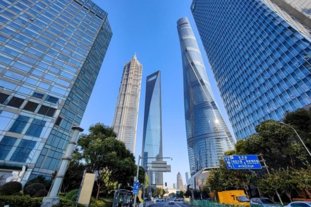 Photo taken on Dec. 2, 2021 shows several skyscrapers in Shanghai's Pudong New Area. (Photo by Wang Gang/People's Daily)